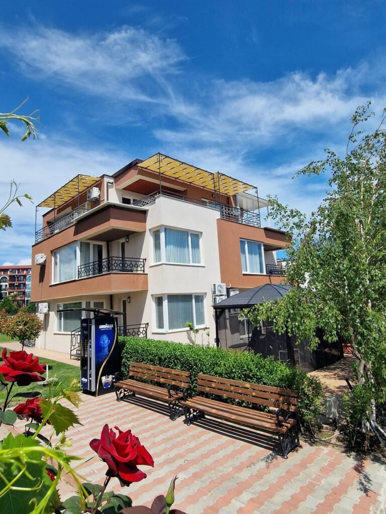 Green landscaped garden at Ferano Beach Apartments in Nessebar