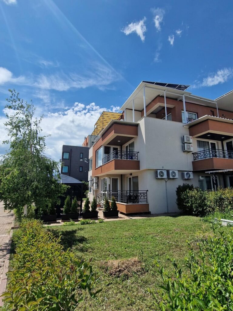 Shaded outdoor lounge terrace at Ferano Beach Apartments, Nessebar