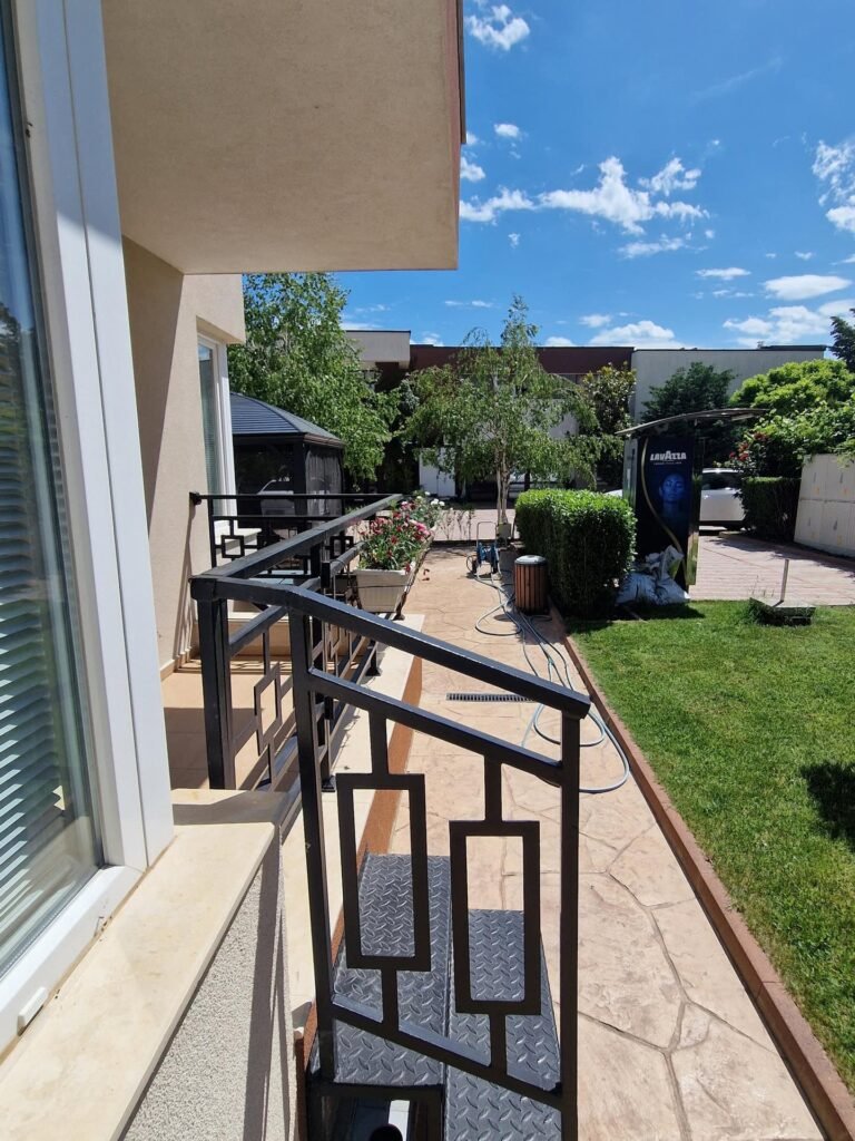 Pine trees and greenery surrounding Ferano Beach Apartments, Nessebar