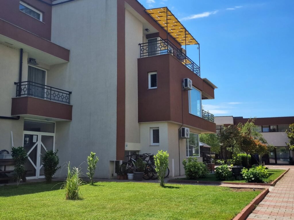 Garden seating nook at Ferano Beach Apartments, Nessebar